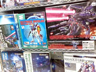 Bootleg Gundams For Sale on a shelf in a local mall