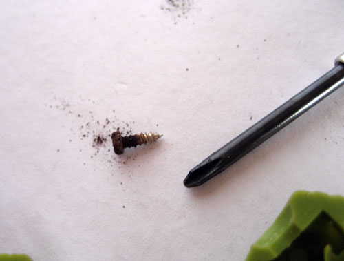 How to Fix G.I. Joe Figures with broken rubber bands: removing the back screw