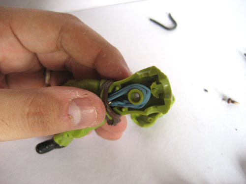How to Fix G.I. Joe Figures with broken rubber bands: hooking the other end to the knob