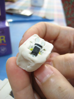 How to make miniature figures using polymer clay mold : figure in the mold