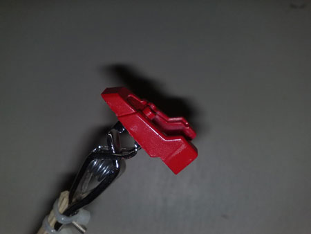 Do It Yourself Painting Clips clamping on to some Gundam feet